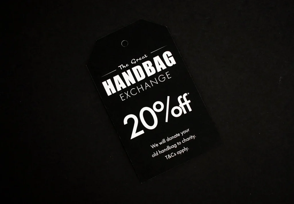 Some discount labels printed for a handbag sale.