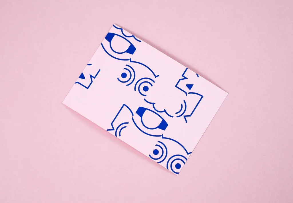 An illustrated gift card featuring bold branding.