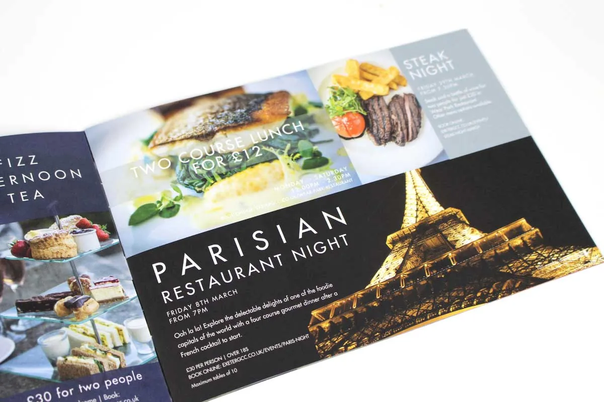 Open hospitality brochure featuring afternoon tea, restaurant promotions and food photography