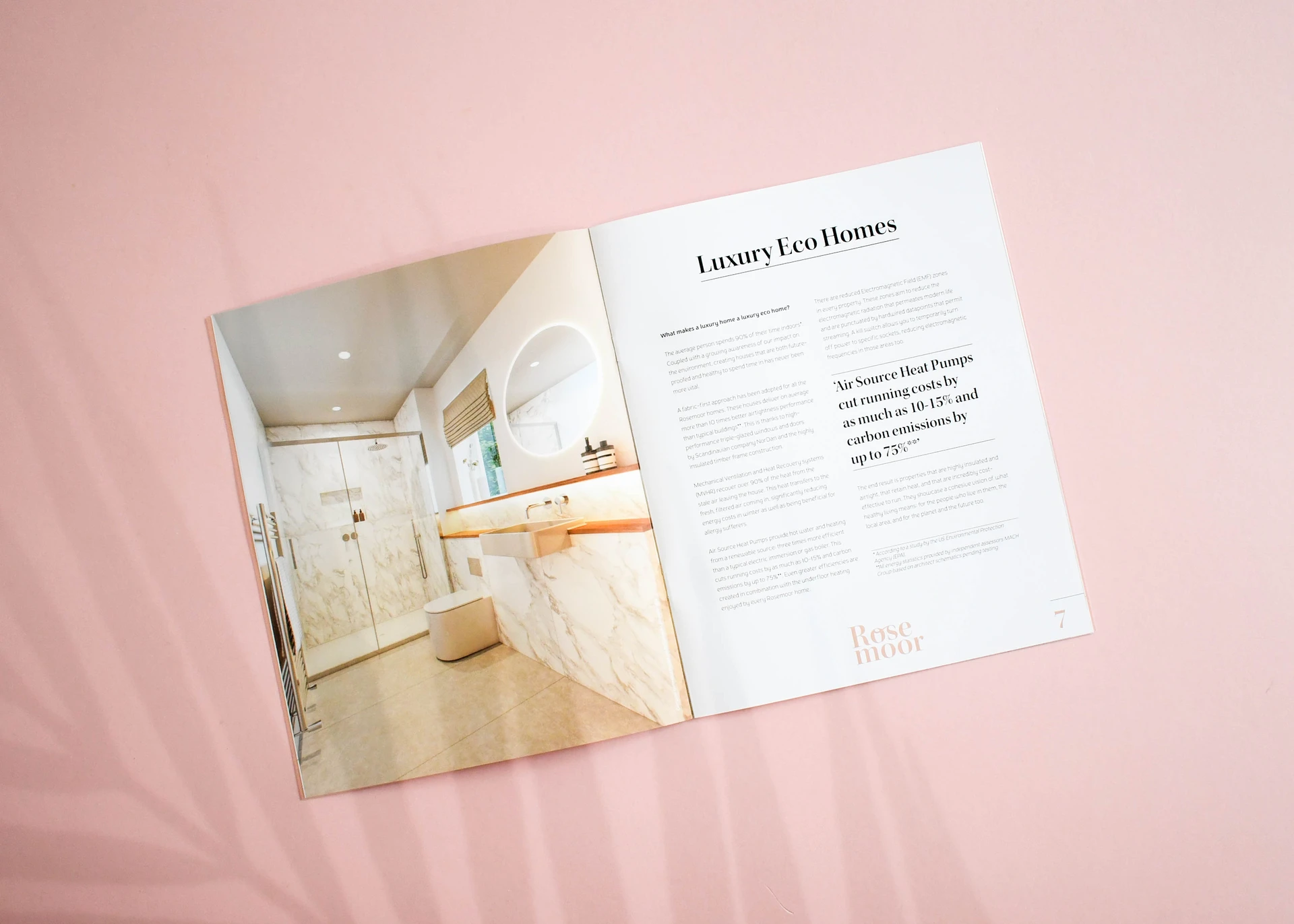 Rosemoor property brochure open at a Luxury Eco Homes spread, with a full-bleed bathroom photograph