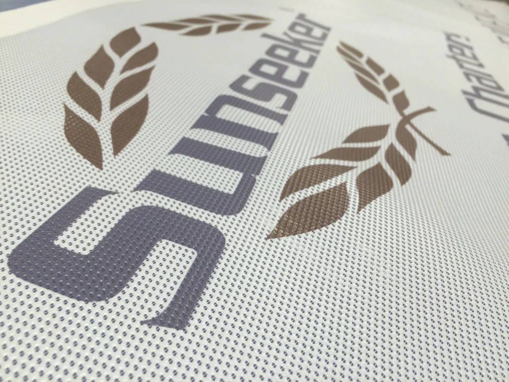 Close up of large print with Sunseeker logo.