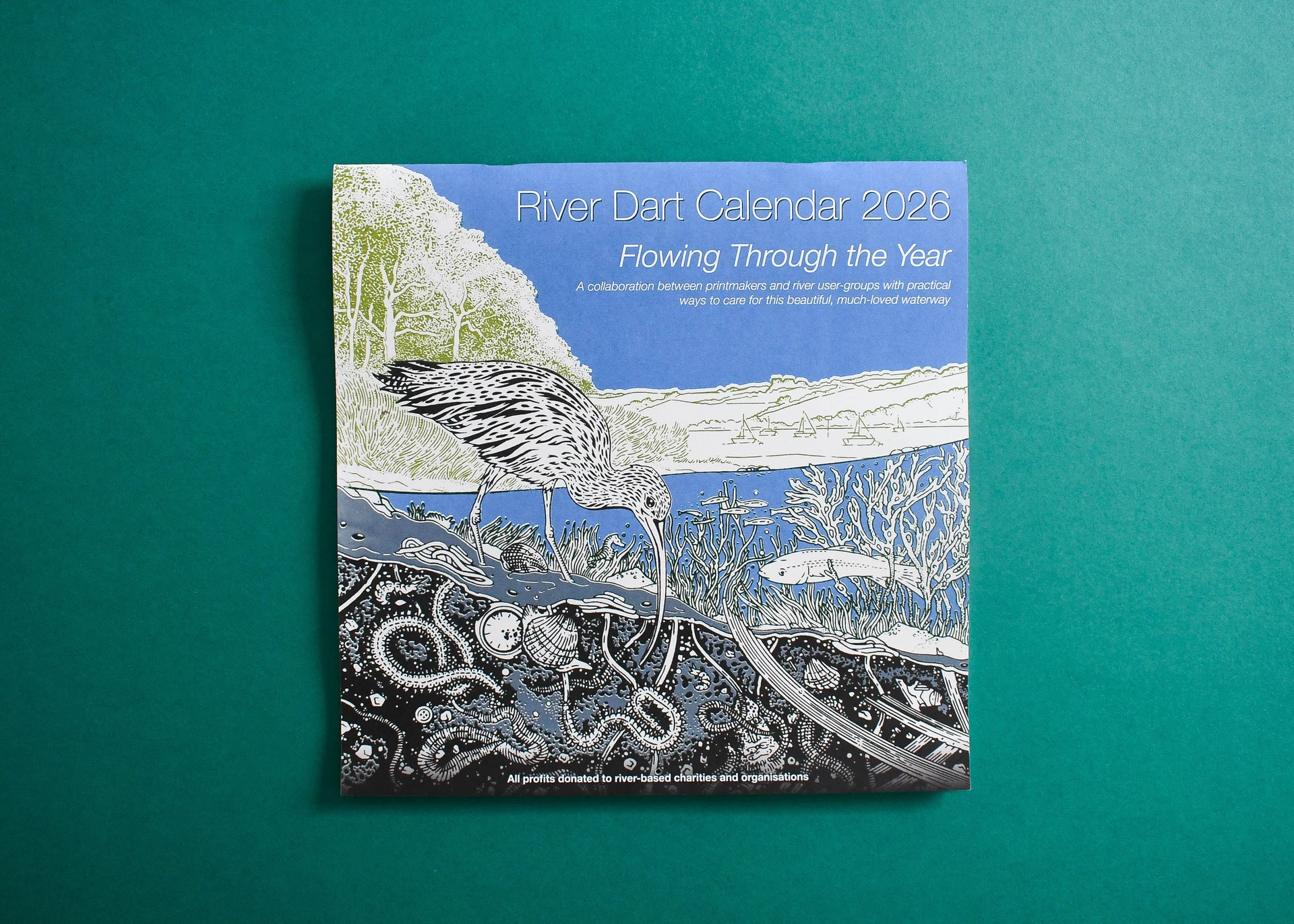 Square River Dart Calendar 2026 cover, linocut curlew wading with the riverbed shown below the waterline.
