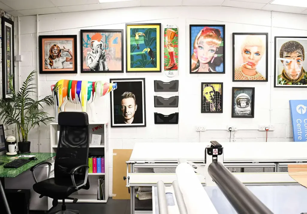 Our large format studio showcasing framed prints of favourite pieces displayed on the walls.
