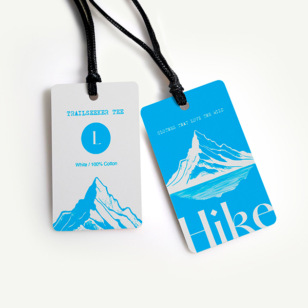 High-quality swing tags printed for a clothing company, used for branding and product labelling.