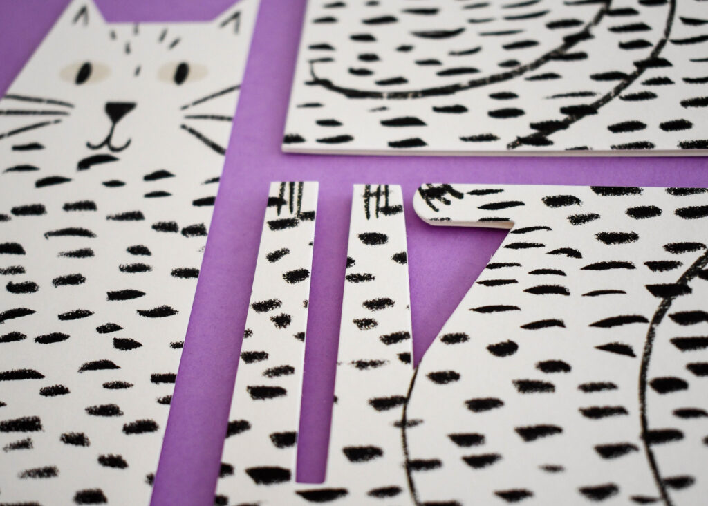 Custom cut out greeting card of a black and white cat