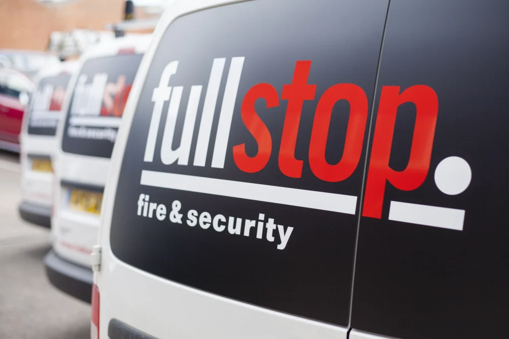 A Full Stop Fire & Security vehicle with graphics printed and fitted by Ashley House printing compnay.