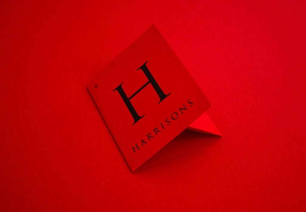 Red custom designed and printed tag on a red background