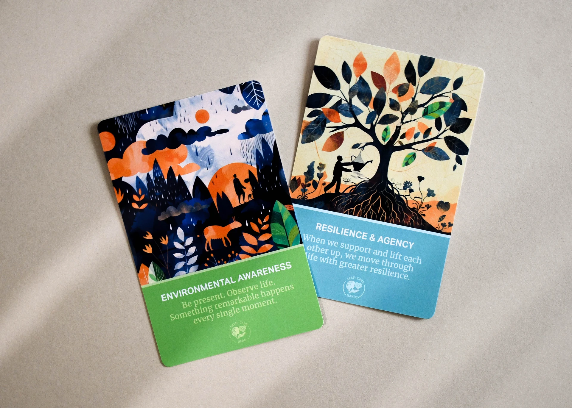 Illustrated printed cards with rounded corners showing vibrant colours and detailed artwork